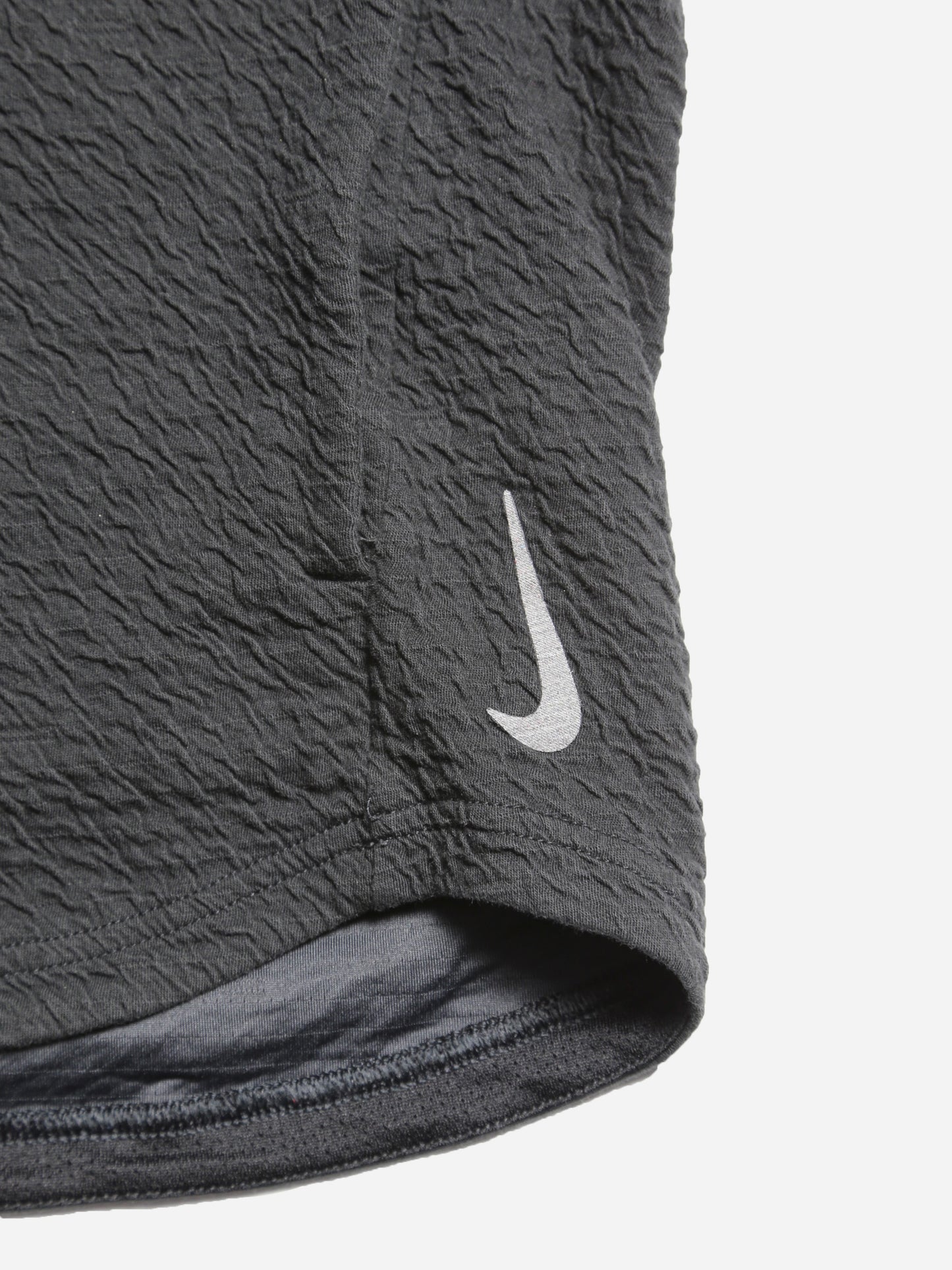 NIKE EMBOSSED TECHNICAL HOODIE